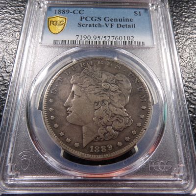1889-CC PCGS GENUINE SCRATCH VF DETAIL CARSON CITY MORGAN SILVER DOLLAR