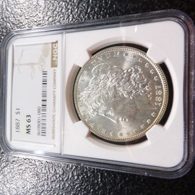 1887 NGC MS63 MORGAN SILVER DOLLAR
