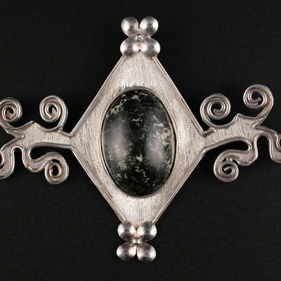 Sale Photo Thumbnail #263: Indigenous Silver and Serpentinite Pendant