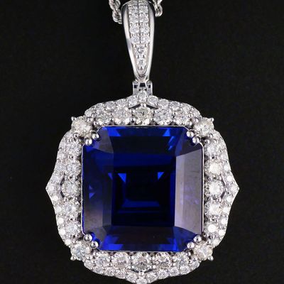 Sale Photo Thumbnail #8: GIA 32.57ct Tanzanite Platinum Diamond Pendant