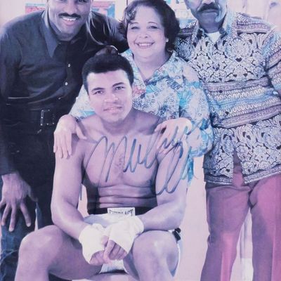 Sale Photo Thumbnail #156: Signed Muhammed Ali Photo with His Family