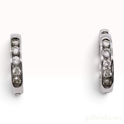 Sale Photo Thumbnail #402: A Pair of 18K White Gold and Diamond Huggie Hoop Earrings