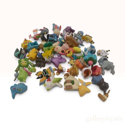 Sale Photo Thumbnail #365: A Collection of Nintendo Pokemon Plastic Figures and Finger Puppets