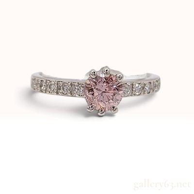 Sale Photo Thumbnail #151: Estate Platinum and 0.61ct Natural Fancy Orangy Pink Diamond Solitaire Ring