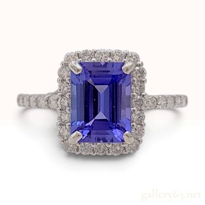 Sale Photo Thumbnail #581: Platinum 1.75ct Emerald Cut Tanzanite and 0.37ctw Diamond Halo Ring size 7