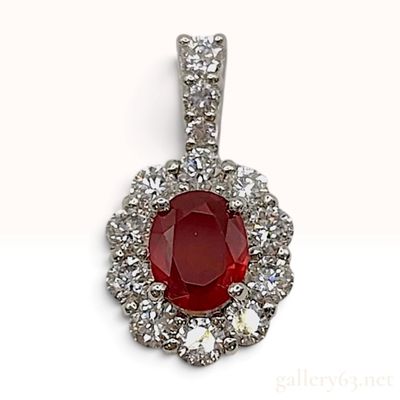 Sale Photo Thumbnail #508: A PT900 Platinum Natural Unheated Pigeon Blood Ruby and 0.58ctw Diamond Halo Pendant Accompanied by AIGS Report