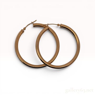 Sale Photo Thumbnail #431: A Pair of 10K Rose Gold Polished Hoop Earrings