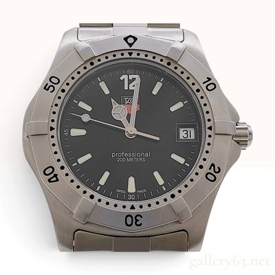 Sale Photo Thumbnail #306: TAG Heuer 2000 Series Professional WK1110-1 Black Dial Stainless Steel Wristwatch with Box and Papers