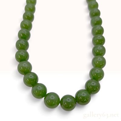 Sale Photo Thumbnail #225: Vintage Natural Green Nephrite Jade Graduated Bead Necklace with 14 Karat Yellow Gold Clasp