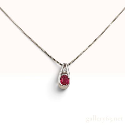 Sale Photo Thumbnail #331: Platinum Ruby and Diamond Pendant Necklace