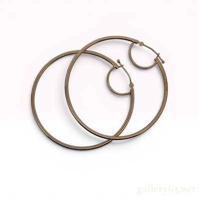 Sale Photo Thumbnail #378: A Pair of Italian 10K Yellow Gold Large Tubular Hoop Earrings