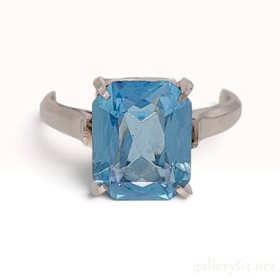 Sale Photo Thumbnail #113: Vintage 14 Karat White Gold Emerald Cut Blue Topaz Solitaire Ring US Size 6.5 Accompanied by Presentation Box