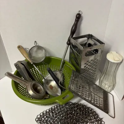 Sale Photo Thumbnail #58: Assorted vintage kitchen utensils.