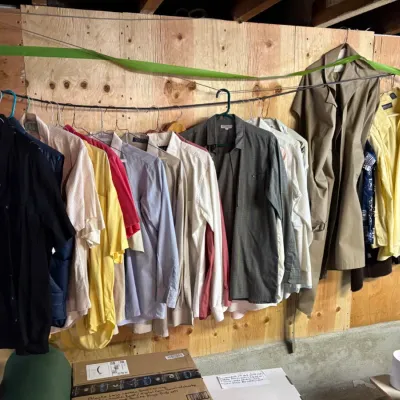 Sale Photo Thumbnail #66: Assortment of men's button-down shirts and outerwear.