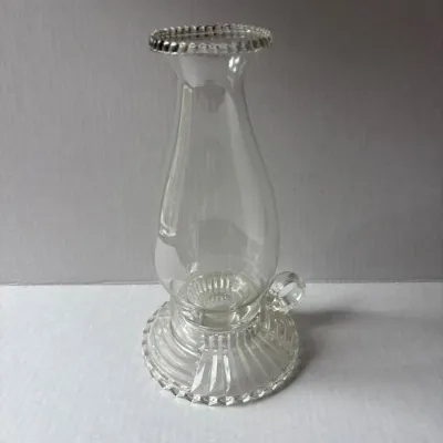 Sale Photo Thumbnail #5: Vintage clear pressed glass finger-loop candlestick holder with a matching glass hurricane chimney shade.