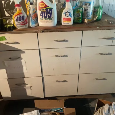 Sale Photo Thumbnail #45: Vintage storage cabinet featuring nine drawers.