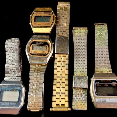 Sale Photo Thumbnail #14: A Collection of Vintage Digital LCD Quartz Wristwatches and Metal Bands