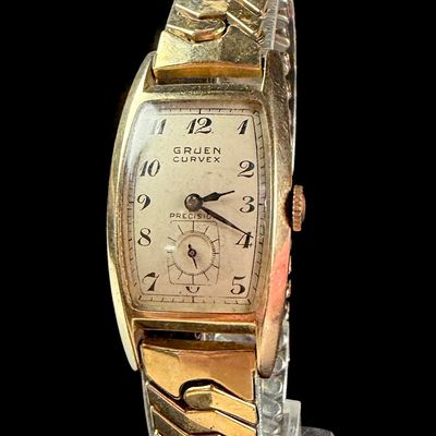 Sale Photo Thumbnail #199: Gruen Curvex Precision 14 Karat Solid Gold Wristwatch Ref 440 450