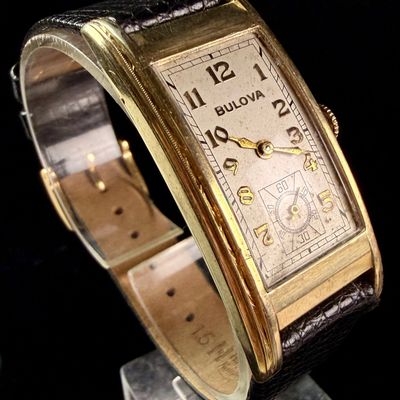 Sale Photo Thumbnail #146: Bulova 10K Gold Filled Curvex Style 21 Jewel Manual Wind Wristwatch