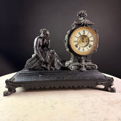Sale Photo Thumbnail #116: Ansonia Clock Co. Figural Cast Metal Mantel Clock with Open Escapement