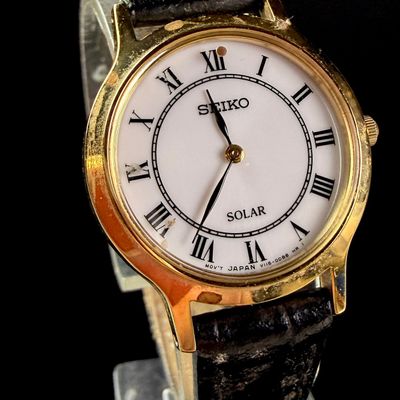 Sale Photo Thumbnail #183: Seiko Ladies Solar Gold Tone and Stainless Steel Quartz Wristwatch V115-0BS0