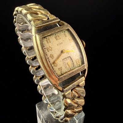 Sale Photo Thumbnail #63: Elgin Manual Wind Tank Wristwatch with Speidel Expansion Band