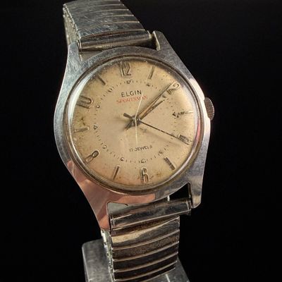 Sale Photo Thumbnail #94: Elgin Sportsman Stainless Steel Seventeen Jewel Manual Wind Wristwatch