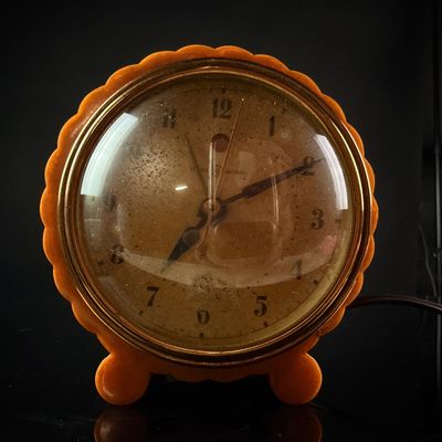 Sale Photo Thumbnail #118: General Electric Model AB30 Art Deco Electric Alarm Clock in Orange Catalin