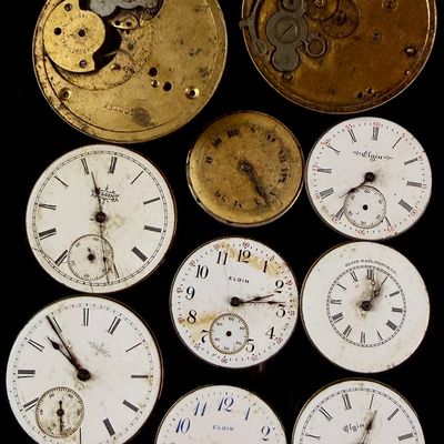 Sale Photo Thumbnail #77: A Collection of Antique Elgin National Watch Co. Pocket Watch Movements and Dials