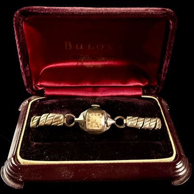 Sale Photo Thumbnail #130: Bulova Ladies 10K Rolled Gold Plate and Sterling Silver Manual Wind Wristwatch with Fifth Avenue Presentation Box