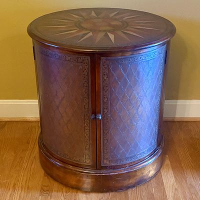 Circular Mahogany Finish Drum Side Table with Inlaid Sunburst Motif and Embossed Door Panels
