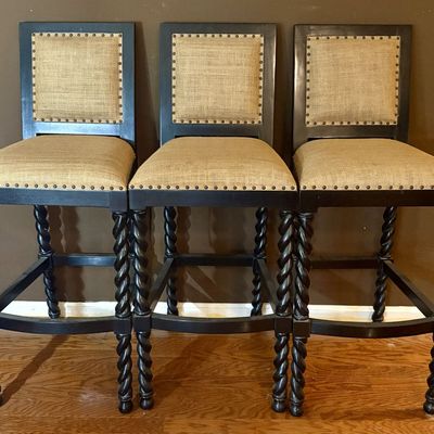 A Trio of Spanish Colonial Style Barley Twist Bar Stools with Burlap Upholstery