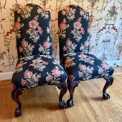 A Pair of Queen Anne Style Upholstered Side Chairs with Ball and Claw Feet