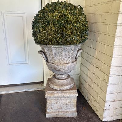 Weathered Metal Garden Urn on Pedestal with Preserved Boxwood Topiary Ball