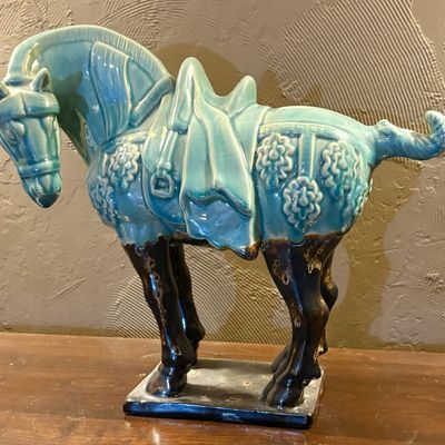 A turquoise-glazed earthenware caparisoned horse in the Tang dynasty style
