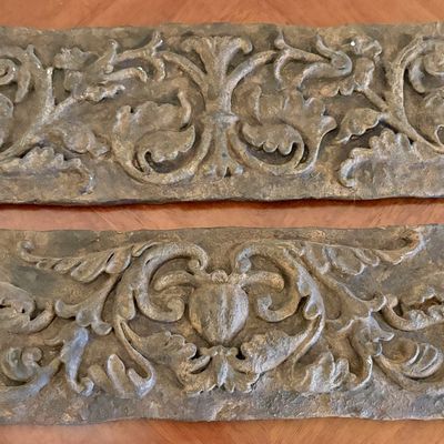 A Pair of Laville Composition Relief Wall Plaques with Acanthus Foliage