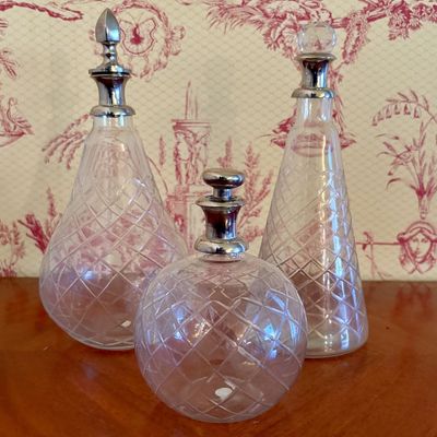 Three Cut Lead Crystal Decanters with Metal and Glass Stoppers