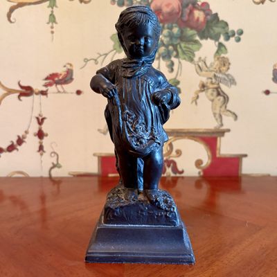 Austin Sculpture Cast Resin Figure of a Girl with Flowers