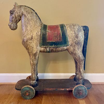 Large Carved Wooden Horse on Wheeled Platform