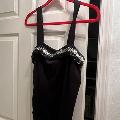 Sleeveless black top or bodysuit featuring silver sequin trim along the sweetheart neckline.