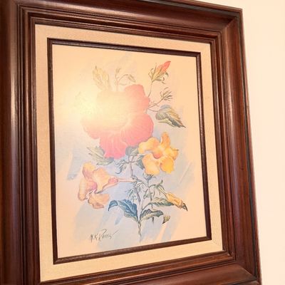 Sale Photo Thumbnail #44: Framed floral print by artist M.K. Rhodes, featuring red and yellow blossoms in a dark wood frame with a fabric liner.
