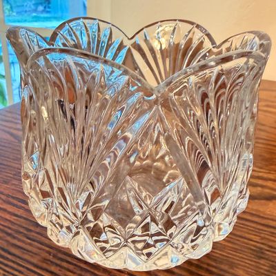 Sale Photo Thumbnail #109: Heavy cut crystal vase featuring fan and diamond motifs with a scalloped rim, shown in excellent condition.