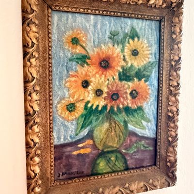 Sale Photo Thumbnail #40: Impressionist-style oil painting of sunflowers in a green vase, signed by the artist and housed in an ornate, carved giltwood frame.