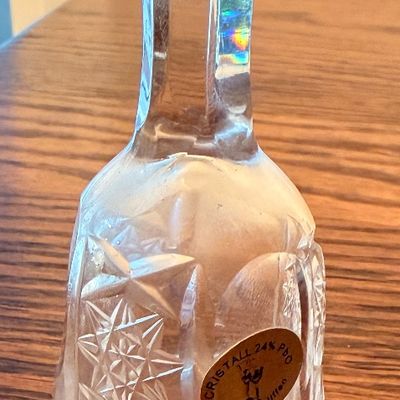 Sale Photo Thumbnail #63: Hand-cut 24% lead crystal dinner bell with starburst pattern and faceted handle, featuring original Cristall label.
