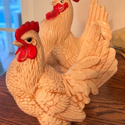 Sale Photo Thumbnail #91: Pair of vintage ceramic rooster figurines featuring detailed feather texturing and glossy red combs.