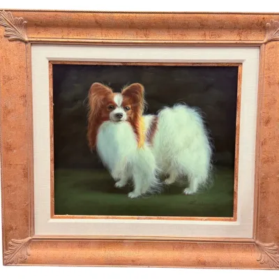 Sale Photo Thumbnail #25: Oil painting of a Papillon dog, housed in an ornate, gilded wooden frame with a linen liner.
