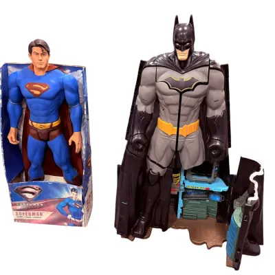 Sale Photo Thumbnail #35: Superman Returns 30-inch action figure in its original open-front box, paired with a large Batman transforming Batcave playset figure.