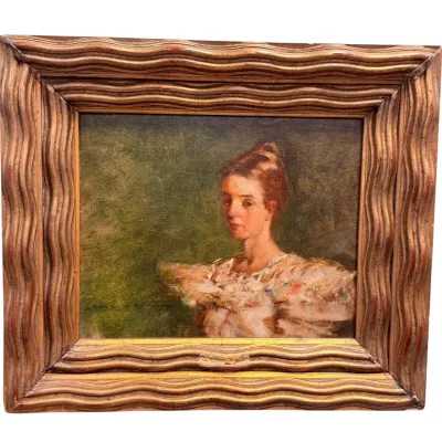 Sale Photo Thumbnail #18: Antique oil portrait of a young woman in a ruffled dress, signed Mary Curtis Richardson, housed in a distinctive wavy giltwood frame.
