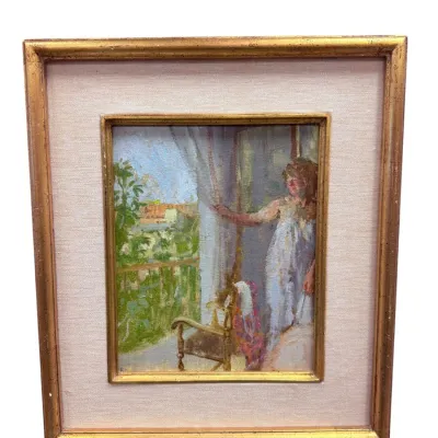 Sale Photo Thumbnail #27: Impressionistic oil painting depicting a woman standing by a window looking out at a balcony, housed in a gilt frame with a fabric mat.