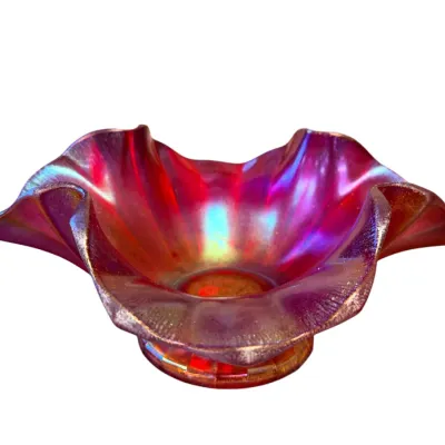 Sale Photo Thumbnail #6: Vintage Fenton amethyst carnival glass bowl featuring a ruffled, crimped rim and a vibrant iridescent finish.